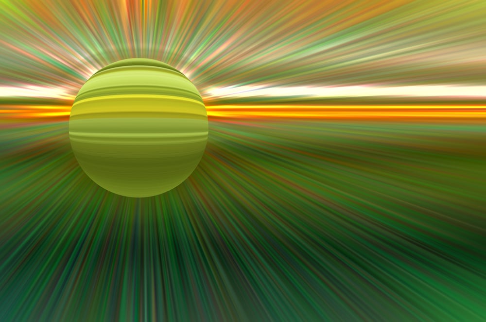 Imaginary abstract of a banded planet with a faint halo in front of a source of radially blurred energy beams, for themes of otherworldliness, cosmic events, or alternate reality (one of a series)