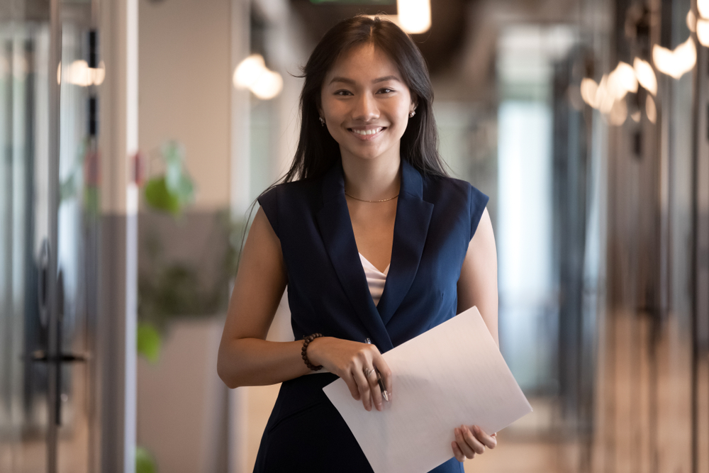 lady in office carrying resume_3-4-22